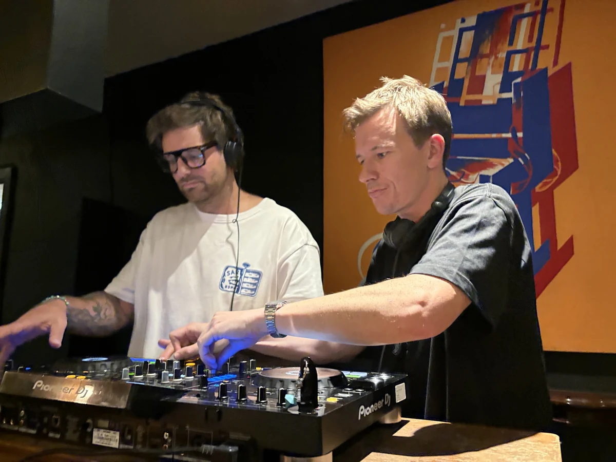 CAFE HAUS DJs at the mixer during a live set